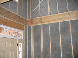 Caulked framing and tightly insulated walls